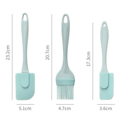 Three silicone kitchen utensils with measurements on a white background