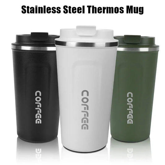 Three stainless steel thermos mugs in black, white, and green with 'COFFEE' text on a white background.