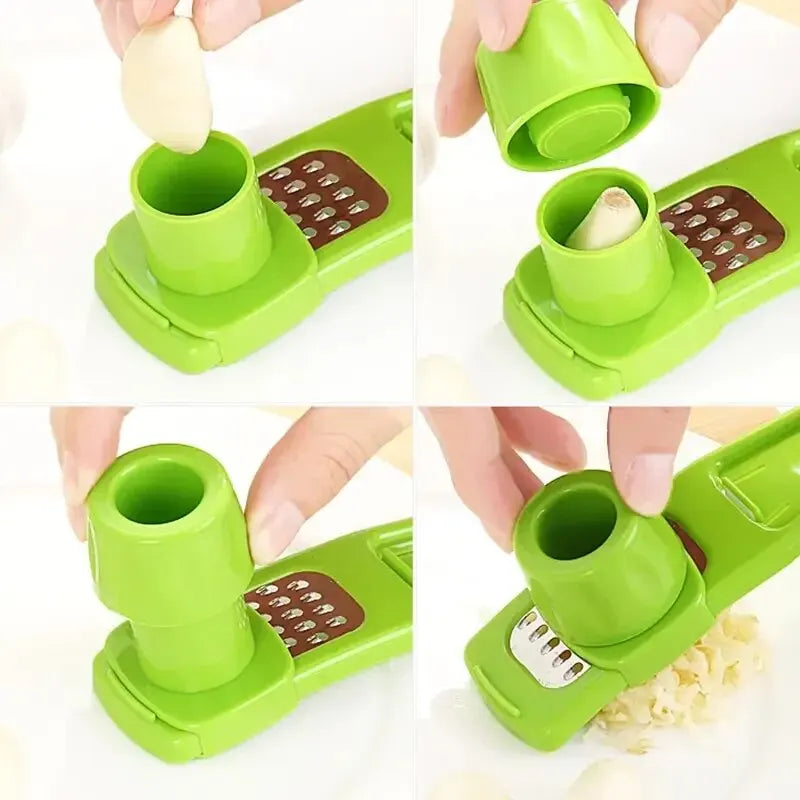 Green garlic press being used to crush garlic on a white background