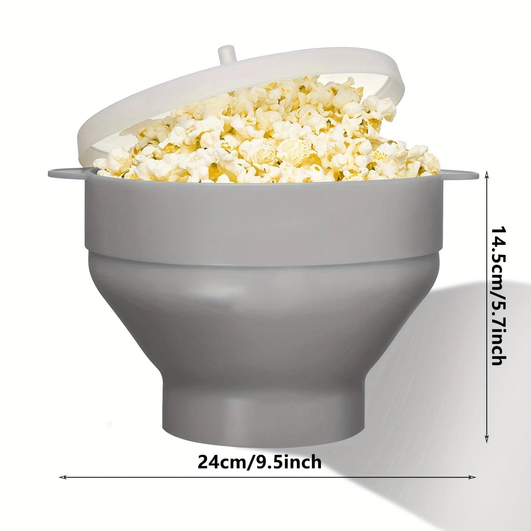 Gray popcorn maker with popped popcorn inside, showing dimensions on a white background