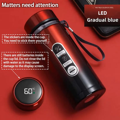 Red thermos with digital display on a red background