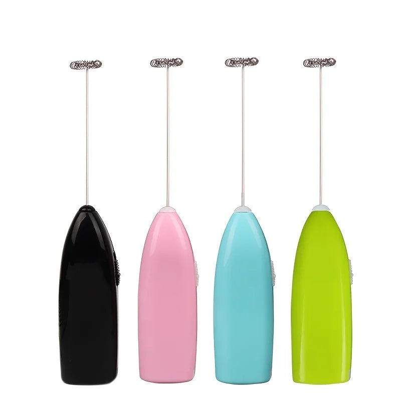 Four colorful milk frothers on a white background