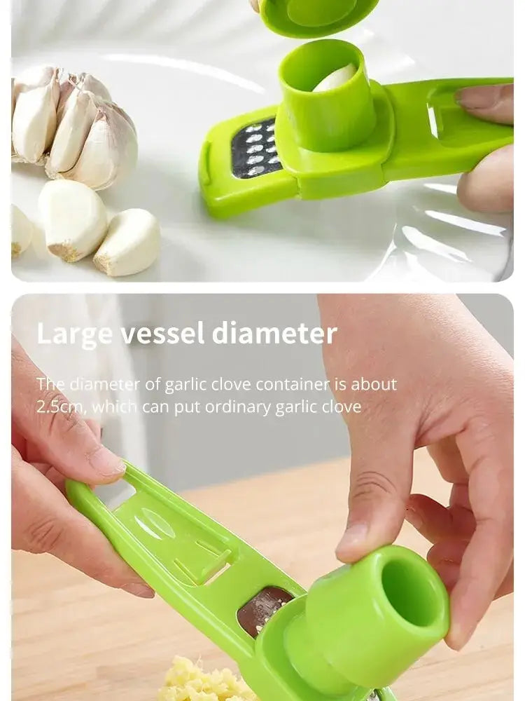 Green garlic peeler with garlic cloves on a white background
